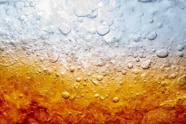 istock Macro soft drinks,Cola close-up,Ice, Bubble, Backgrounds, Ice Cube, Abstract Backgrounds,Ice cold drink,Detail of Cold Bubbly Carbonated Soft Drink with Ice 1306829853