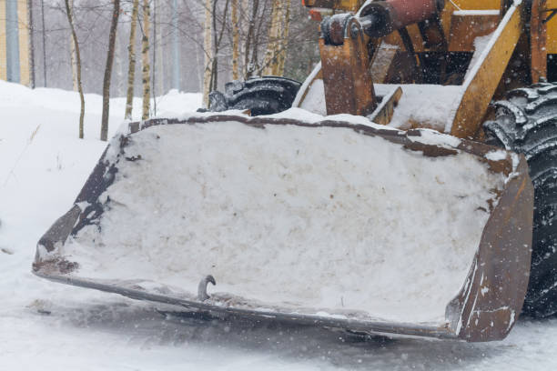 istock Excavator tractor bucket with snow in winter 1306833056