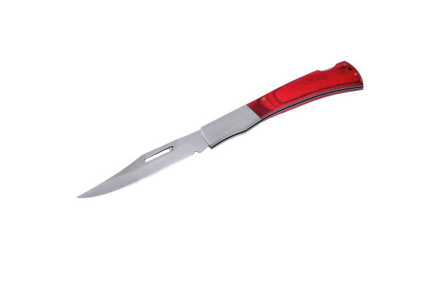 istock an elegant folding knife with wooden overlays on the handle, white background close-up 1306836613