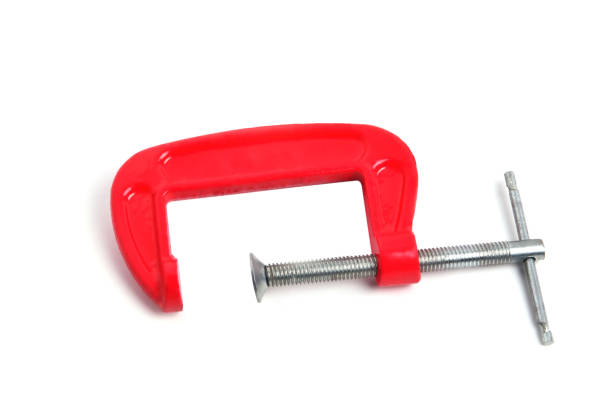 istock metal clamp red close up on a white background isolate 1306837401