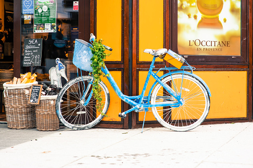 Bicycle Parked Outside A Retail Store With No People