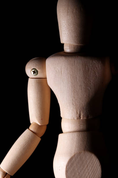 istock wooden mannequin in a studio 1306843292