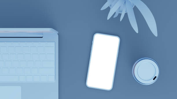 istock Monochromatic 3D render. Office scene. Laptop and smartphone with blank screens. Can be used as mock-up. 1306843545