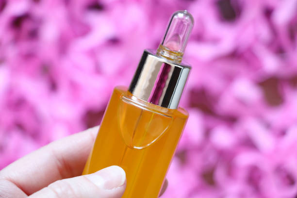 istock Glass bottle with cosmetic essential oil 1306843561