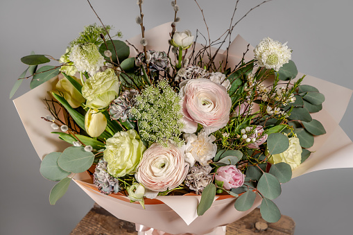 A bouquet of pink and white roses pictured from top