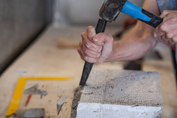 istock Close-up of Mason Hammering Chisel 1306849816