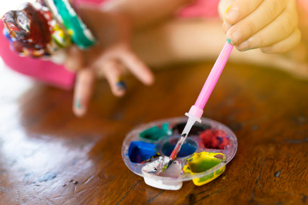 istock Coloring water plaster doll. The concept of developing children's creativity 1306850548