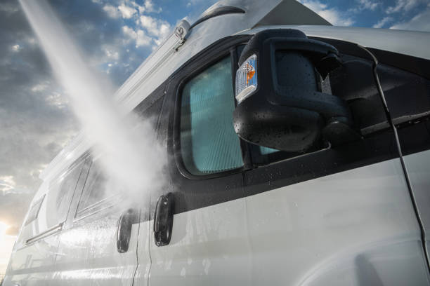 pressure washing rv camper van before summer season - rving imagens e fotografias de stock