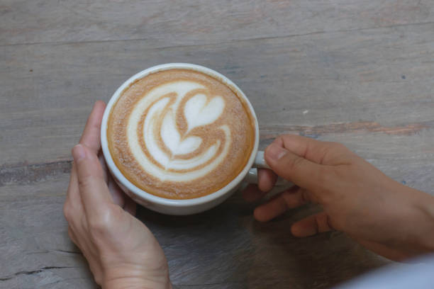 istock Handcraft of hot milk coffee cup 1306851137