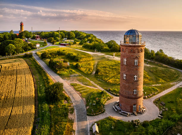 drone view of lighthouses from Kap Arkona drone view of lighthouses in sunset from northern part of island of Ruegen - called Kap Arkona baltic sea stock pictures, royalty-free photos & images