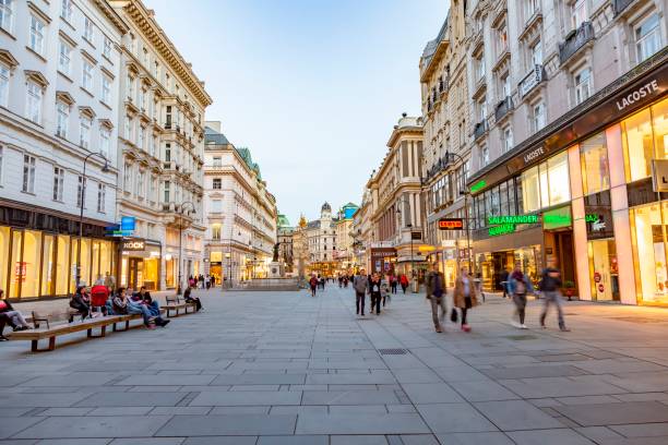 People visit Graben in Vienna by night. Graben street is among most recognized streets in Vienna which is the capital city of Austria Vienna, Austria - April 26, 2015:  People visit Graben in Vienna by night. Graben street is among most recognized streets in Vienna which is the capital city of Austria. people shopping in graben street vienna austria stock pictures, royalty-free photos & images