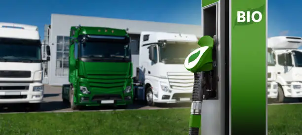 Biofuel filling station on a background of trucks