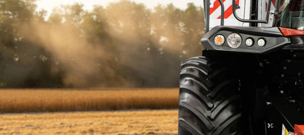 istock Headlight of the combine harvester 1306857132