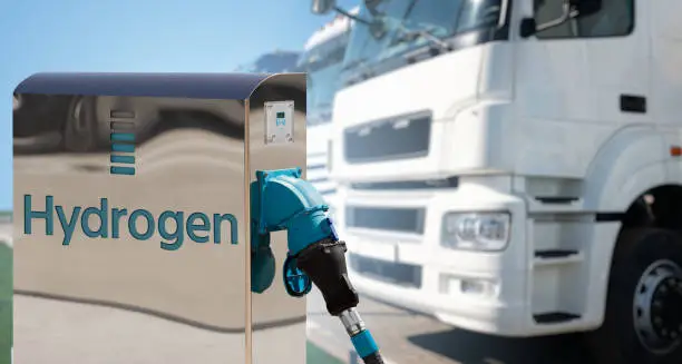 Photo of Hydrogen filling station on a background of trucks