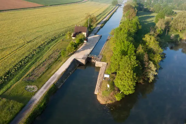 Aerial photograph of the Ravereau lock on the Nivernais and Yonne canal, municipality of Merry-sur-Yonne 89, in the Yonne department, Bourgogne-Franche-comté region, France