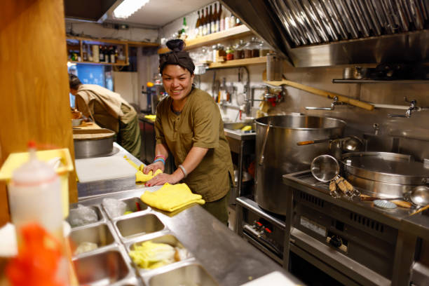 istock Female chef busy cooking in the kitchen 1306859892