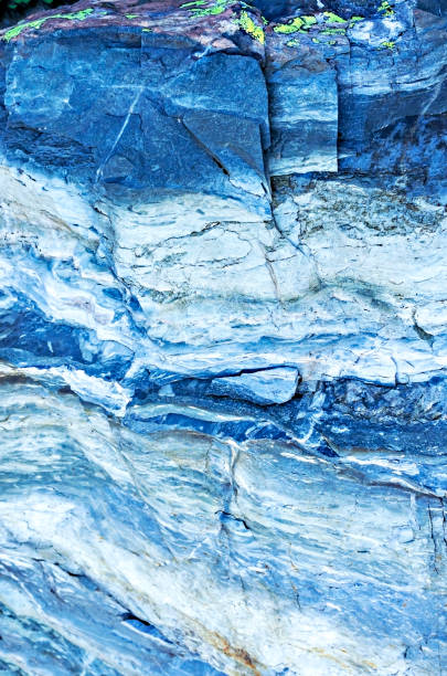 Natural gray blue textured stone background, rock surface, copy space, abstract, vertical, beauty in nature, design