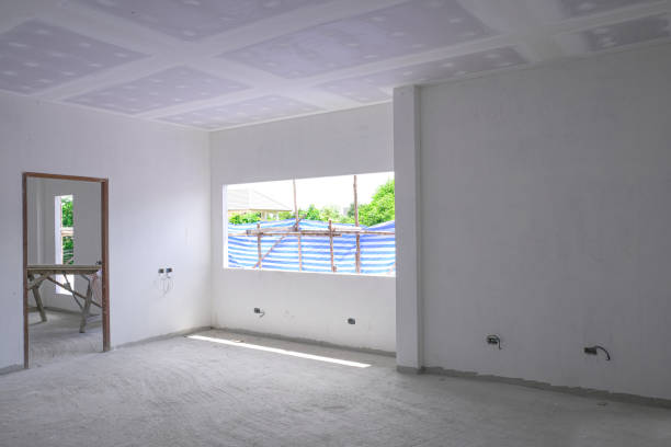 istock New house big window structure.   white lintel plaster intterior design. Empty room in home. 1306868121