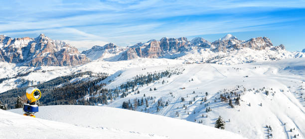 Dolomites mountains. Panoramic view for ski slopes and Marmolada glacier. stock photo