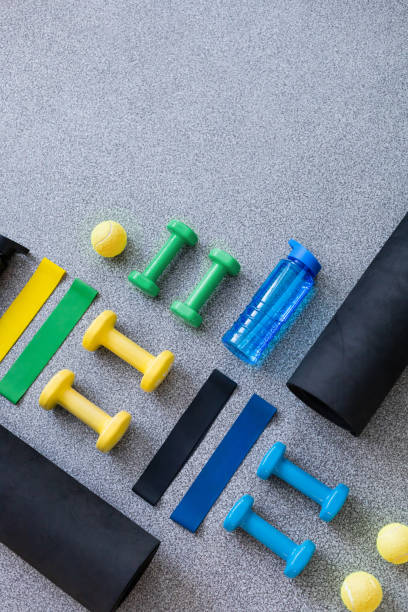 istock Multicolored sports equipment layout top view 1306870957
