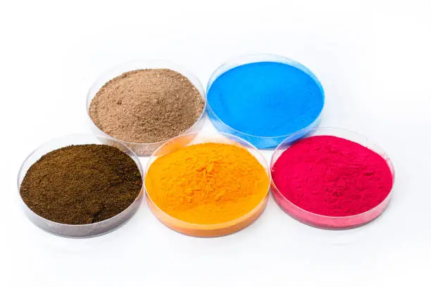 colored pigments, iron oxides used as a dye, in orange, blue and pink