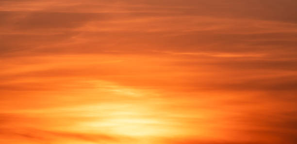istock Beautiful dark orange sky with clouds after sunset. Nature sky sunset background. 1306875795