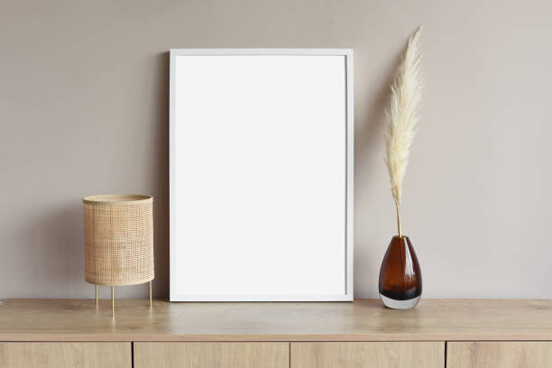 istock Blank picture frame mockup on a wall. Artwork showcase in a living room 1306877906