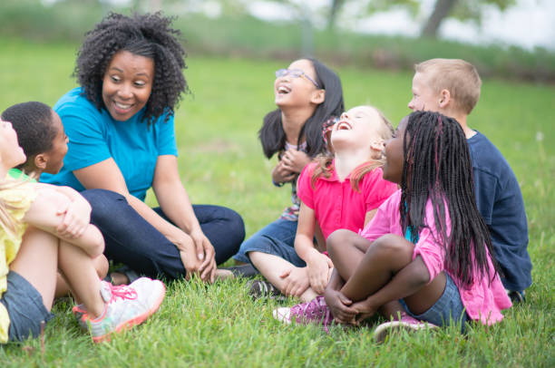 istock Camp Counselor and Children at Summer Camp 1306879309