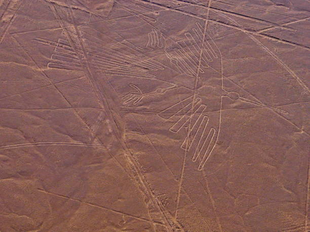 istock Nazca Lines Geoglyph Condor in Nasca valley Peru. Ancient Nasca civilization drawings on Earth surface. 1306881145