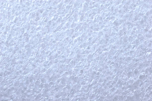 surface poreuse blanche du remplisseur de mousse - shock absorber photos et images de collection