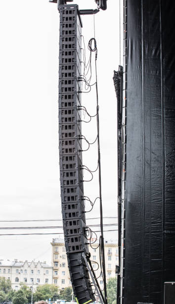 istock Line array sound speakers for live show. Side view. Professional concert equipment. 1306888352
