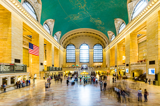 New York, USA - October 22, 2015:   people at Grand Central Terminal, New York City which was first build in 1871. This is the largest subway terminal by number of platforms.