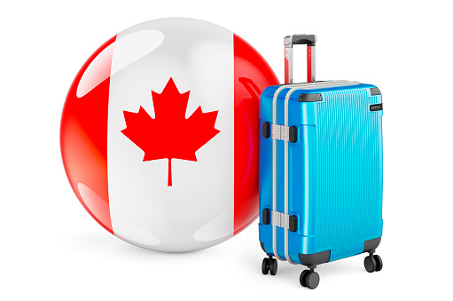 Suitcase with Canadian flag. Canada travel concept, 3D rendering isolated on white background