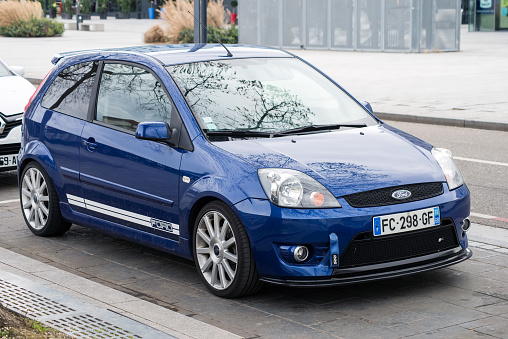 Mulhouse - France - 13 March 2021 - Front view of blue Ford fiesta sport line parked in the street