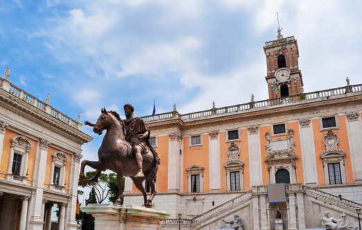 Statue of Marcus Aurelius and Conservators Palace (Palazzo dei Conservatori) on Capitoline Hill in Rome, Italy