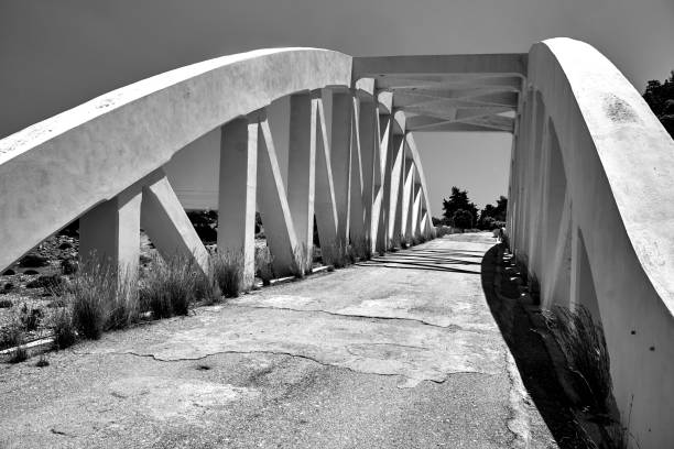 istock A road arched bridge over a dried river on the island 1306900132