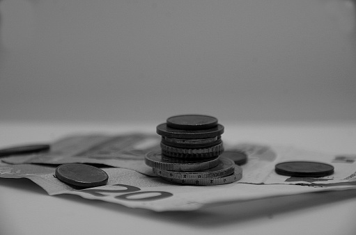 Money Euros stacked coins Black and white