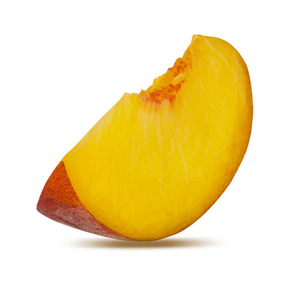 istock Piece peach isolated on white background with clipping path 1306904505