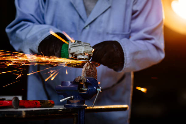 istock Senior men grinding metal 1306908174