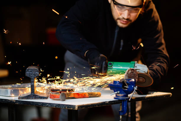 istock Young man grinding metal 1306908455