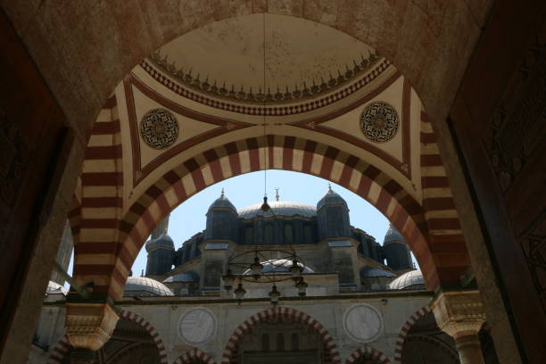 istock Architectural Sections from the Courtyard of Selimiye Mosque in Edirne, Domes, Columns and Floral ornaments on the ceiling and walls, windows 1306910264