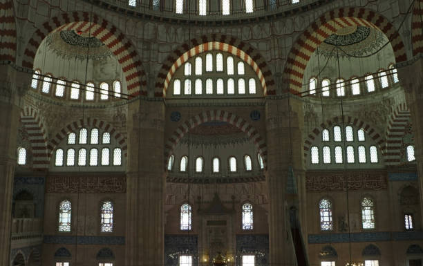 istock Edirne Selimiye Mosque Ceiling, Columns, Domes and Wall Details, There Are Arabic Writings On The Dome 1306910381