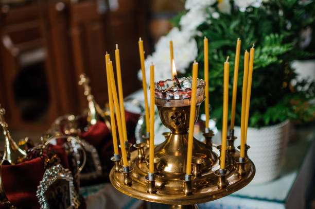 istock stand with candles in the church 1306911906