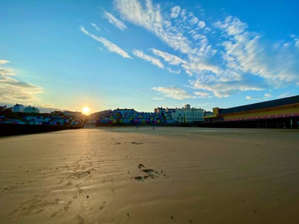 istock Sunset at Walton-on-the-Naze Beach Huts 1306912689