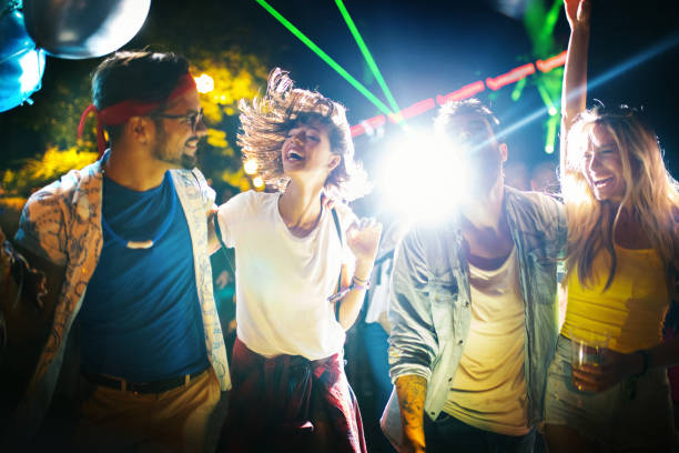 istock Young people at a concert. 1306913671