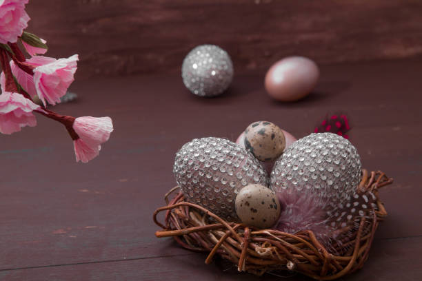 istock Happy Easter nest with eggs on a wooden background. Happy Easter greeting card with creative easter eggs and copy space 1306916013