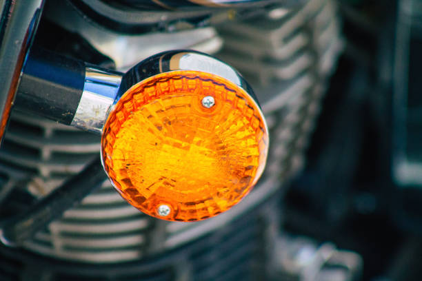 Closeup of a motorcycle rolling in the streets of the city center of the metropolitan area