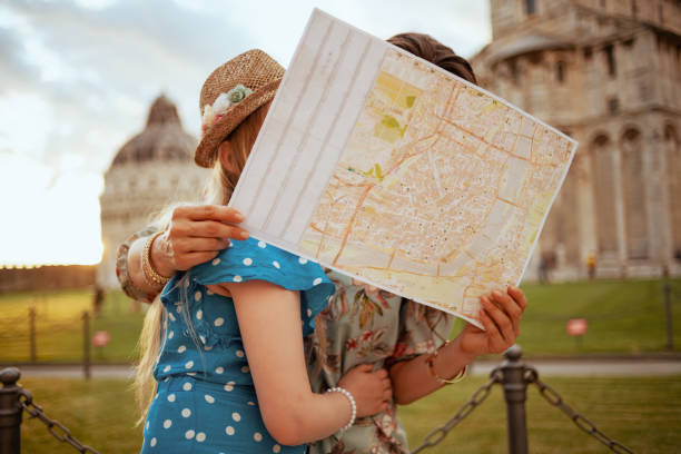istock elegant mother and child with map 1306919018
