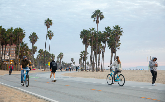 Santa Monica, California, USA - November 2020 :People Biking in Santa Monica beach.