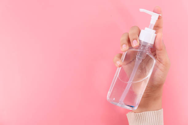 istock women hand using sanitizer gel for preventing virus with copy space 1306933001